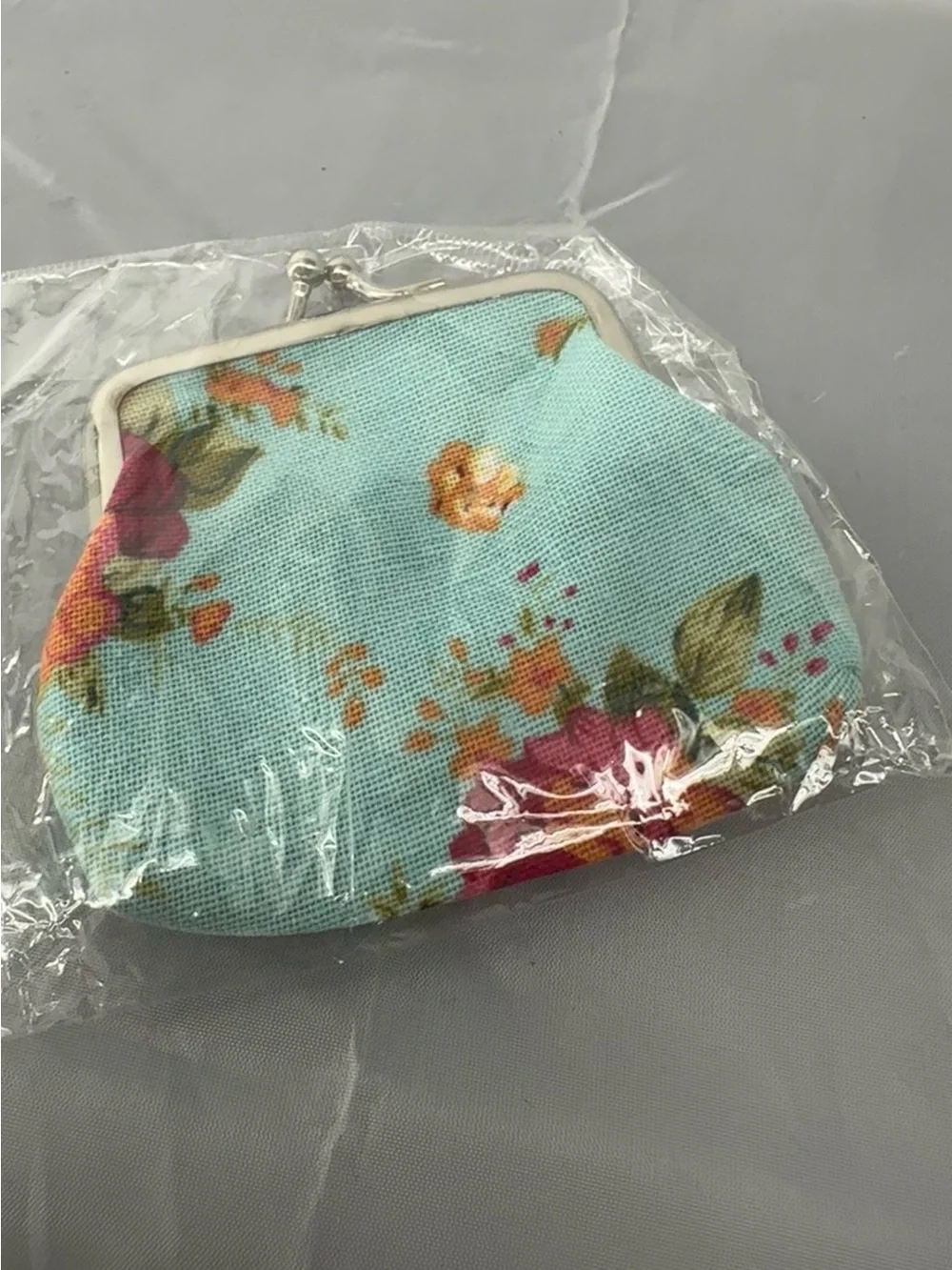 New turquoise floral coin pouch